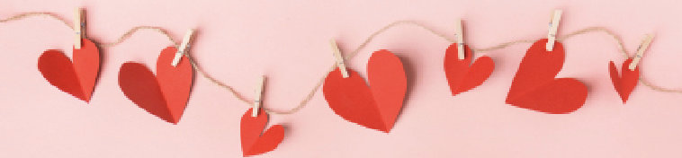Image: Love hearts pegged to a line