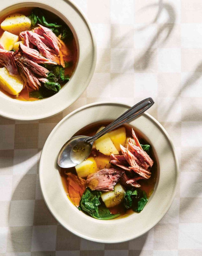 A-smoky-brothy-bowl-of-ham-hock-potatoes-and-greens-photo.jpg
