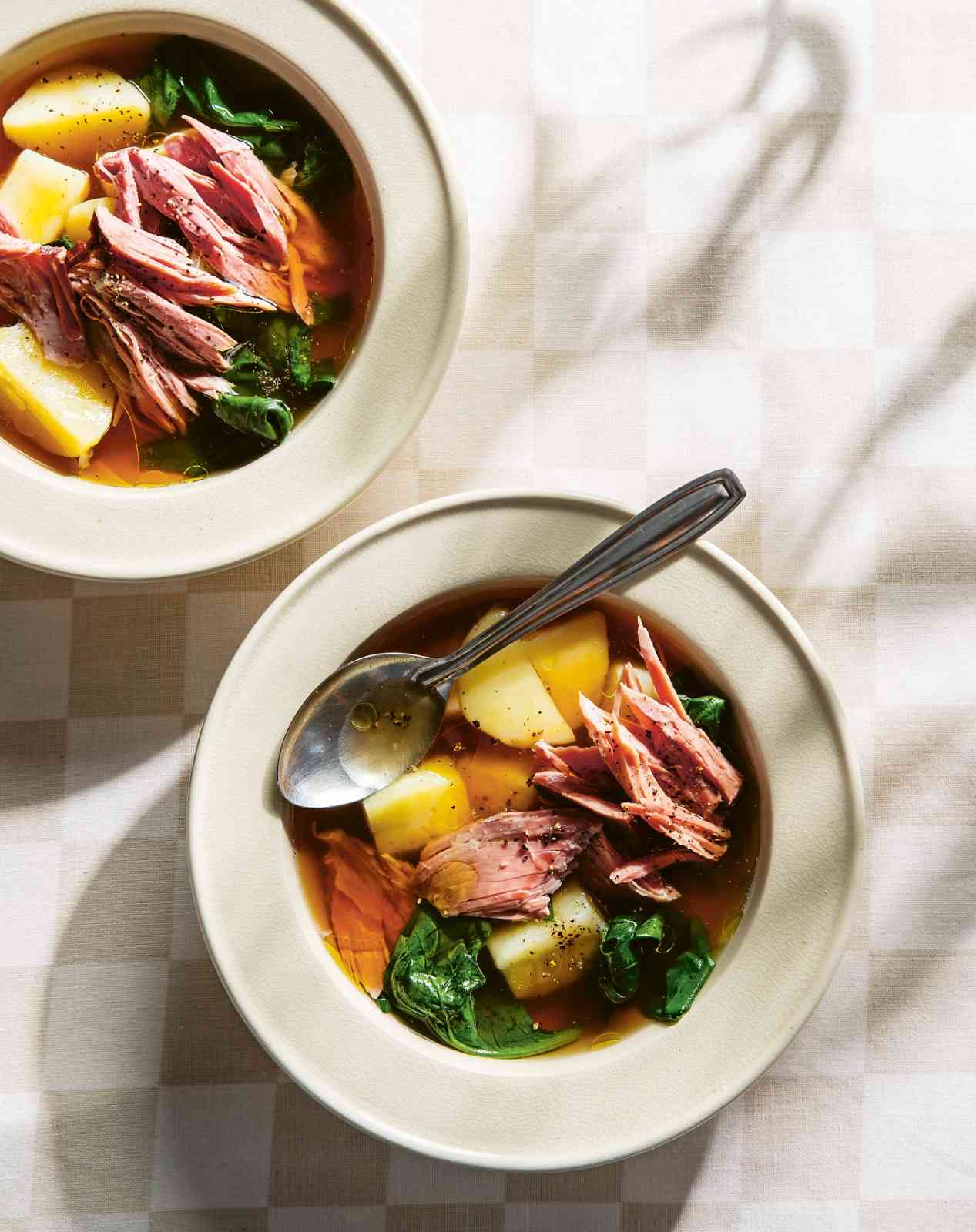 A-smoky-brothy-bowl-of-ham-hock-potatoes-and-greens-photo.jpg A-smoky-brothy-bowl-of-ham-hock-potatoes-and-greens-photo.jpg